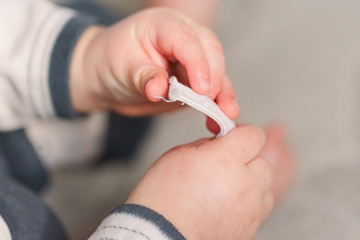 baby hands exploring with touch in Cranberry Township, PA