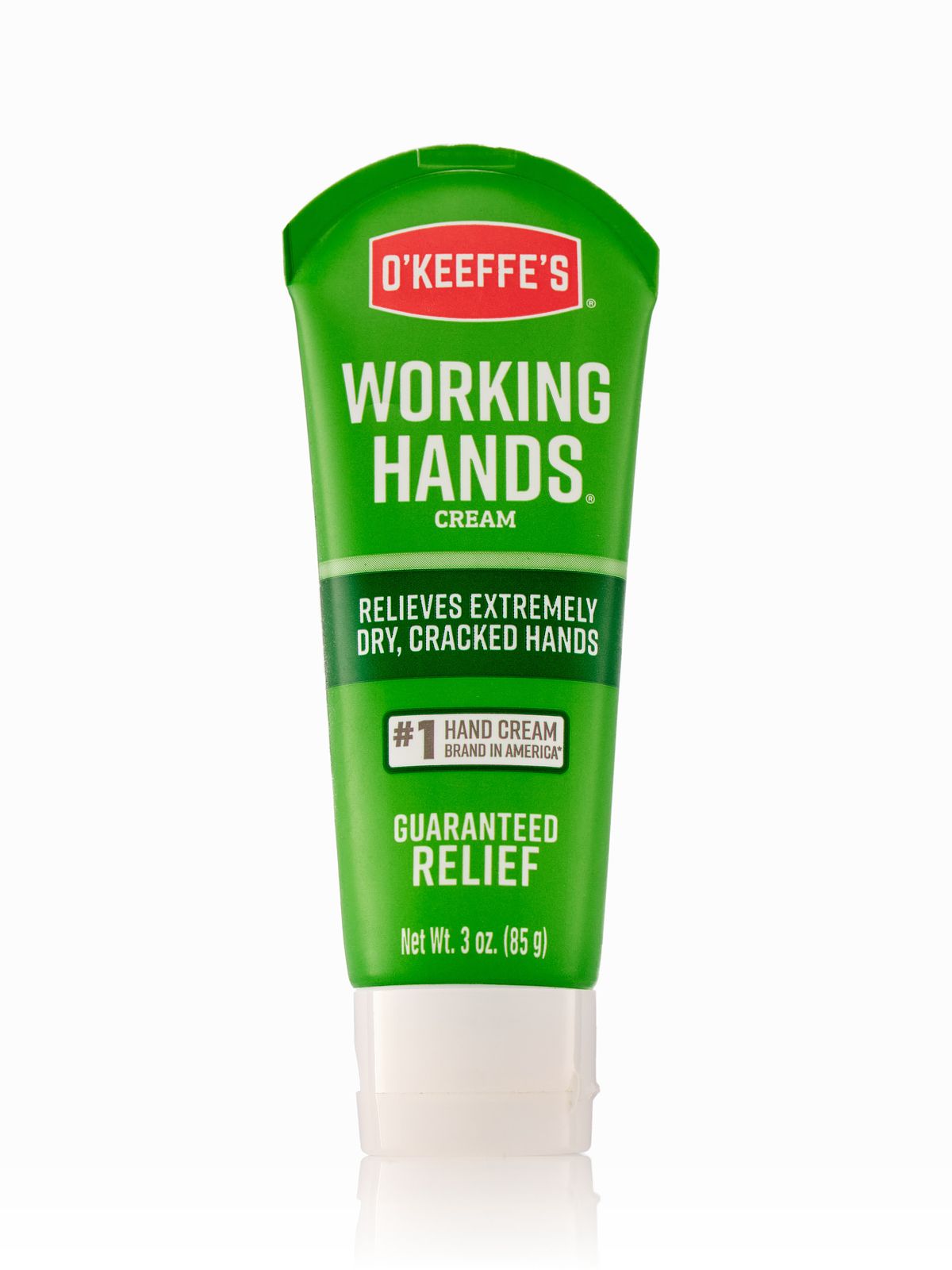 Green tube of hand cream on a white background.