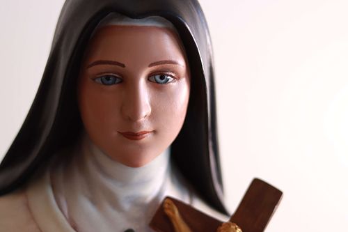 A beautiful picture of the St. Therese statue's face after total restoration.  Ready to go back to St. Joseph Catholic Church in Somerset, Ohio.