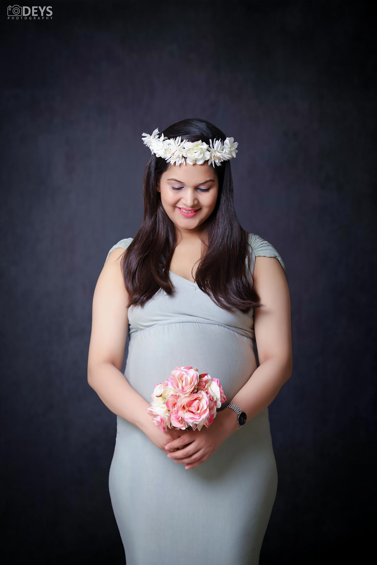 Mint green gown maternity studio photoshoot in Delhi