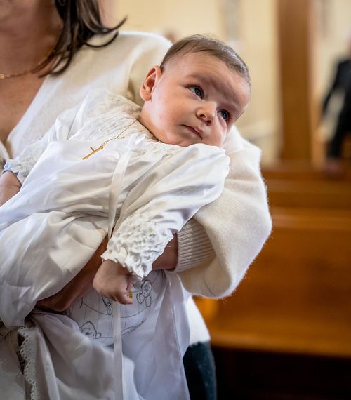 Ottawa Catholic baptism photographer capturing emotional moments