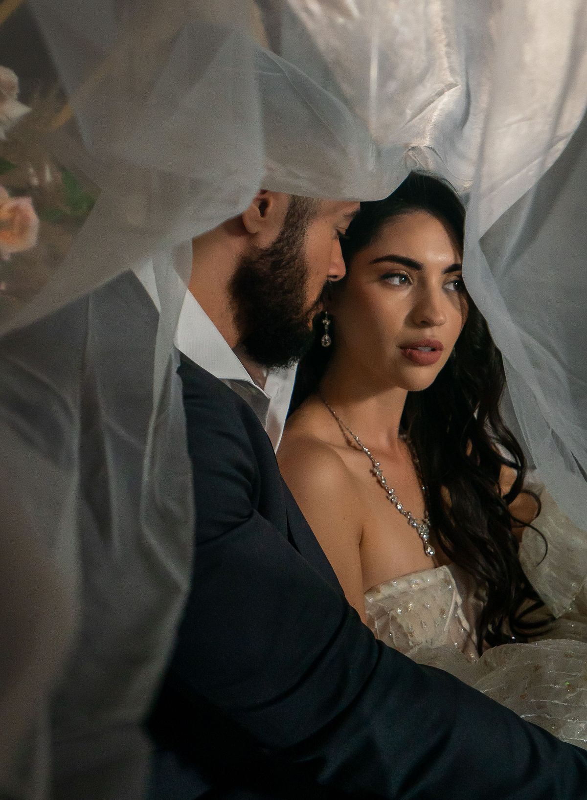 Bride and groom sharing a moment on their wedding day.
