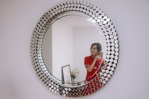 Chinese bride getting ready for traditional tea ceremony