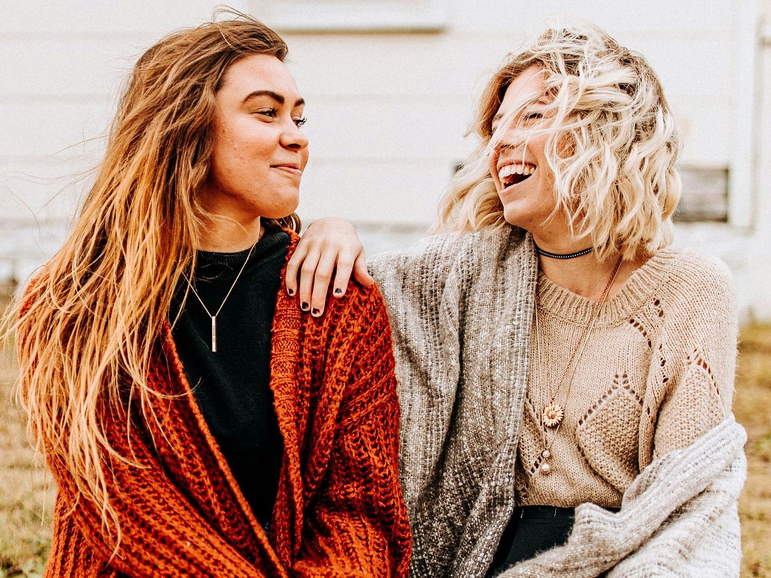 two perimenopause women sharing their stories and laughing