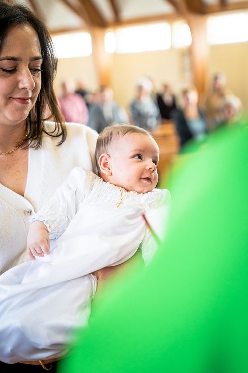 Ottawa Catholic baptism photographer capturing emotional moments
