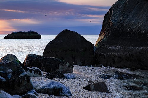 Romantic light over sea and shore.