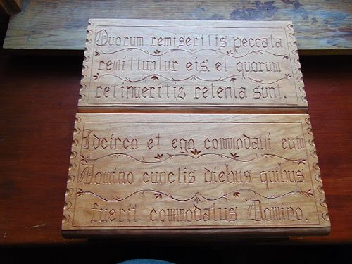 both lids with their respective scripture verses carved into them