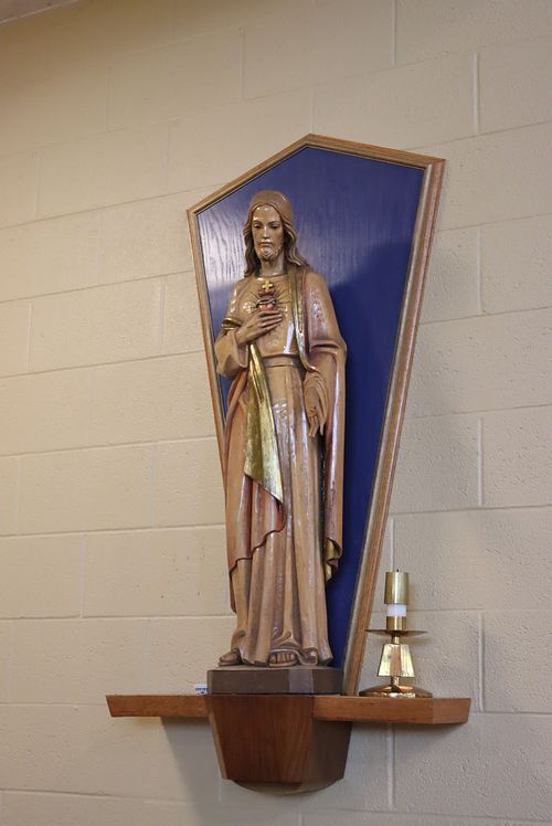 The statue before it was restored on its old, mid-century modern pedestal