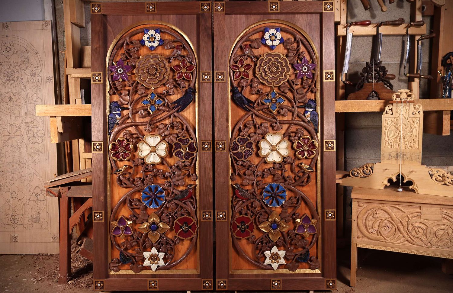 Richly carved and painted doors for the altarpiece at St. Bernadette Catholic Church