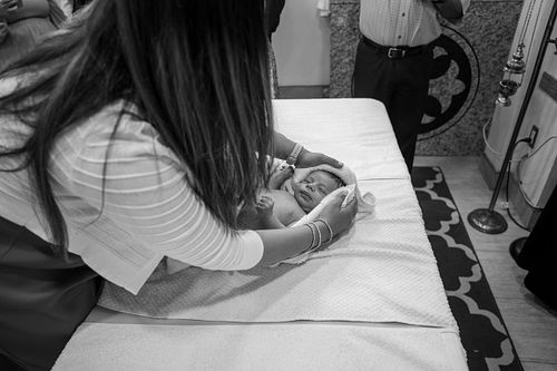 baby baptism ceremony at Ottawa church captured by Kameel Photography