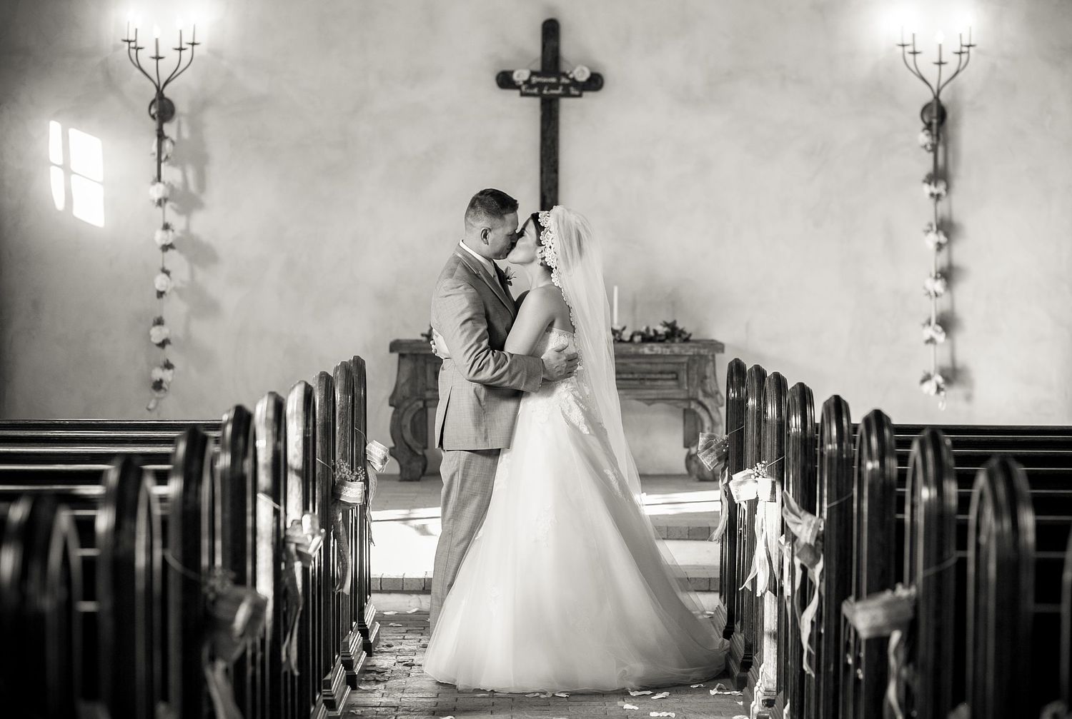 Bride and groom first kiss New Braunfels TX wedding photographer