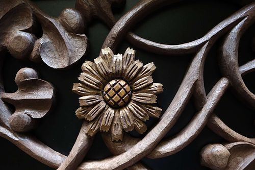 hand-carved and hand-painted goatsbeard flower by Wes and Kelly Baker for St. Joseph Shrine in St. Bernadette Catholic Church in Lancaster, Ohio