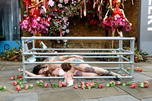 Animal rights activists art installation and outreach outside the Saatchi Gallery, London, UK