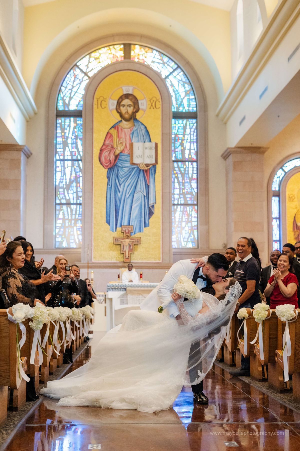 Exchanging vows at Saint Joseph, Husband of Mary Roman Catholic Church in Las Vegas Wedding Photography