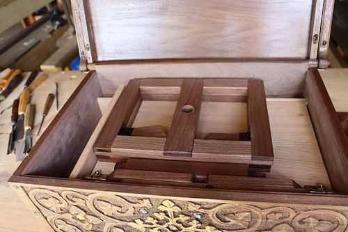 showing first level of storage space with the collapsible missal stand