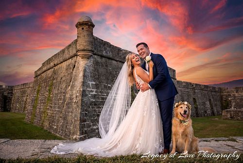 Wedding couple at Castillo de San Marcos during sunset in St. Augustine by Legacy of Love Photography.