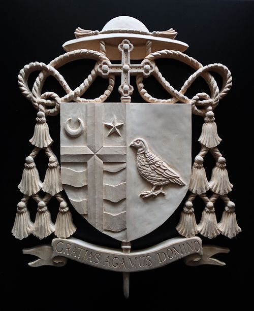 hand carved coat of arms for catholic bishop