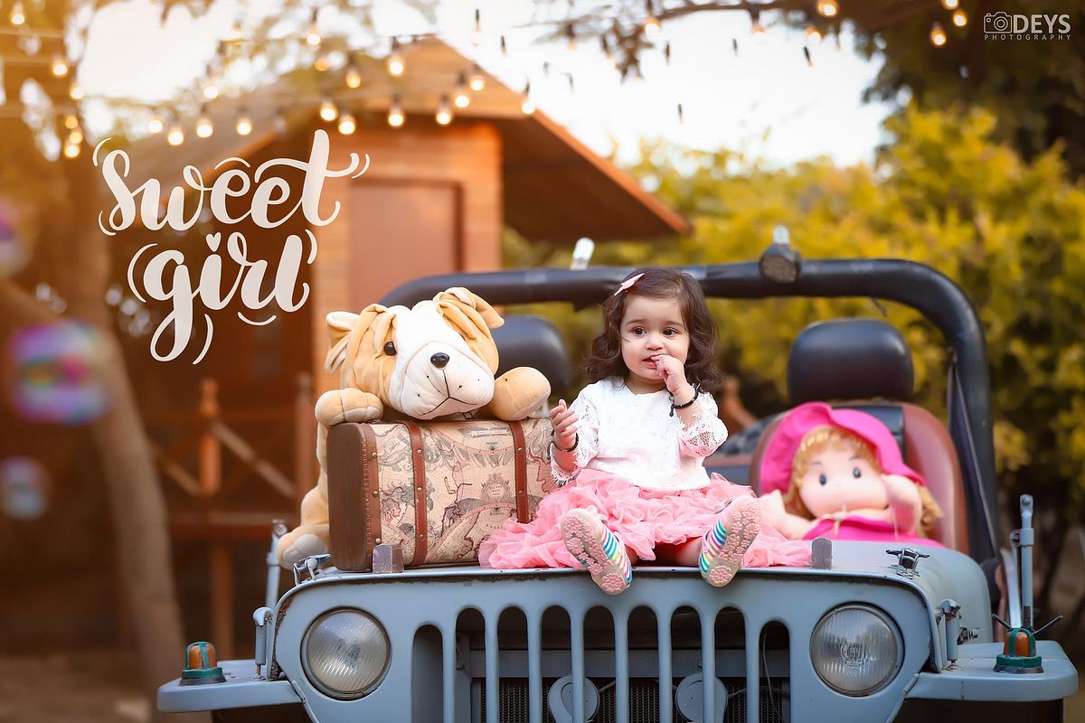 Pre birthday setup in car baby shoot