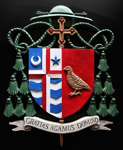 polychrome hand painted heraldic carving of coat of arms