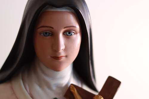 A beautiful picture of the St. Therese statue's face after total restoration.  Ready to go back to St. Joseph Catholic Church in Somerset, Ohio.