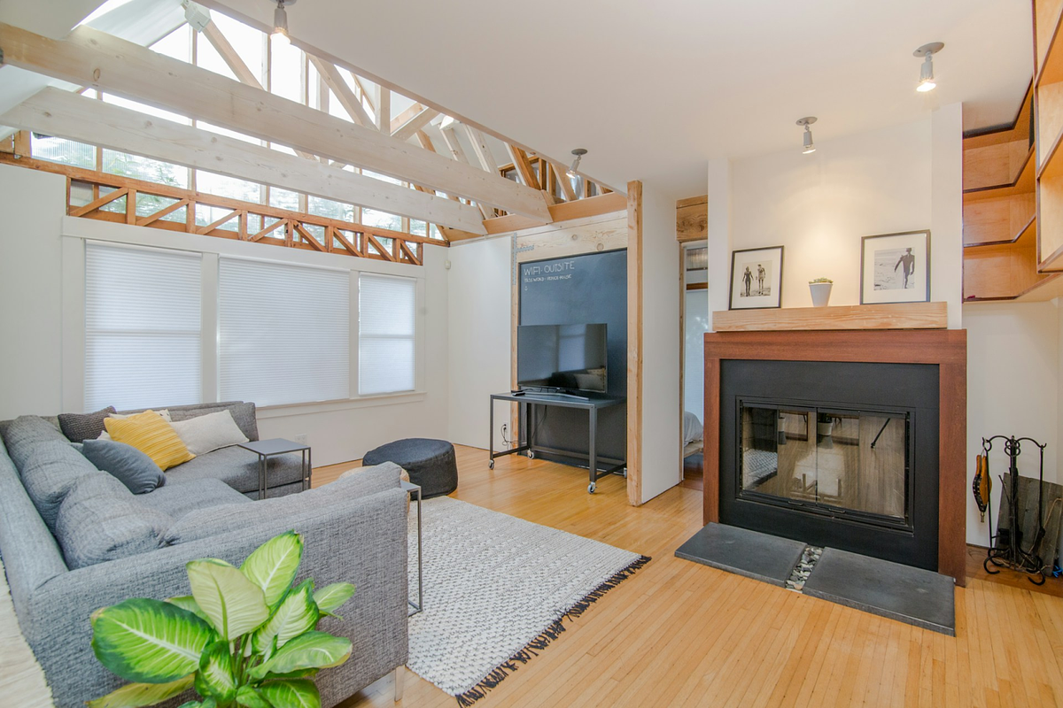 modern living room with a fireplace and cozy decor