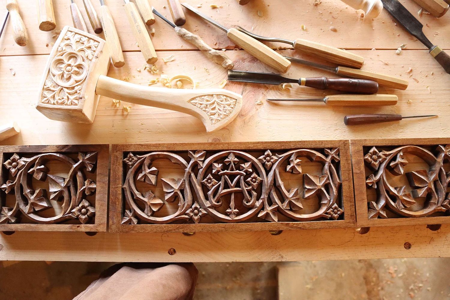 Scrolling vines and flowers and Blessed Virgin Mary by Catholic Wood Carver Wes Baker