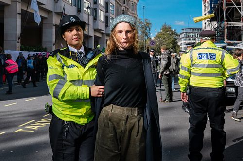 Climate activists including Fossil Free London disrupt the Energy Intelligence Forum, London, UK
