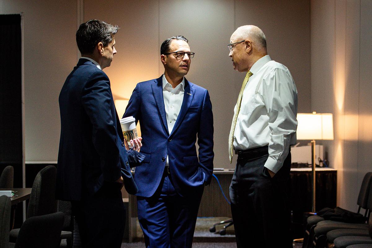 Backstage leadership moment between Governor Josh Shapiro and AFSCME President Lee Saunders at the 45th AFSCME Convention in Philadelphia, documented by corporate event photographer Andriana Ortiz.