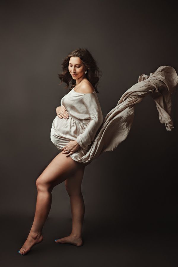 Pregnant woman having so much fun captured by Maternity Photographer In Houston, TX