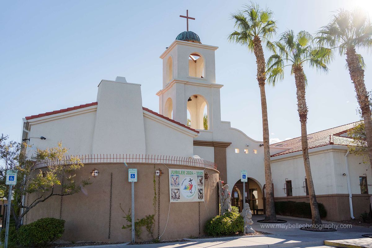 exchanging vows at Saint Joseph, Husband of Mary Roman Catholic Church in Las Vegas Wedding Photography
