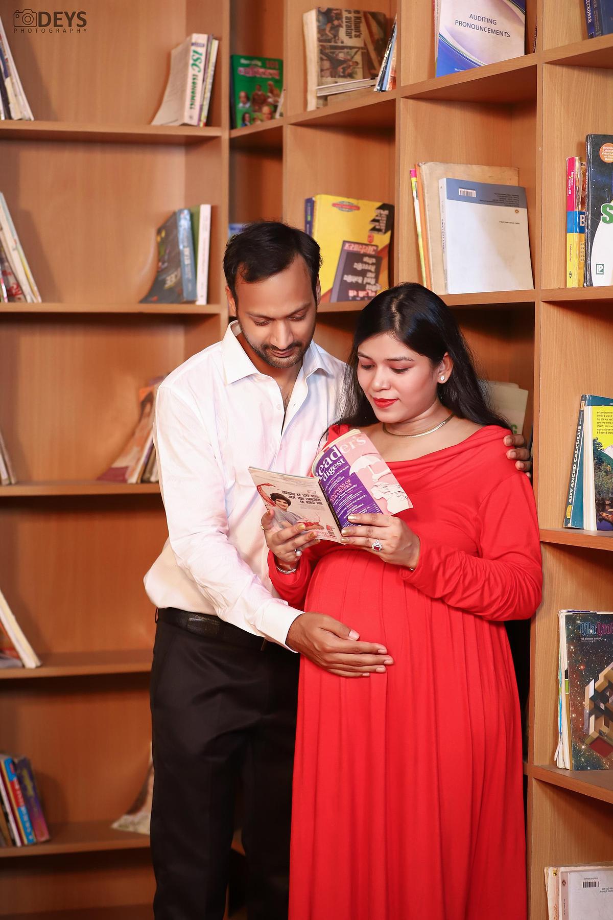 Couple maternity pictures in theme studio in Meerut