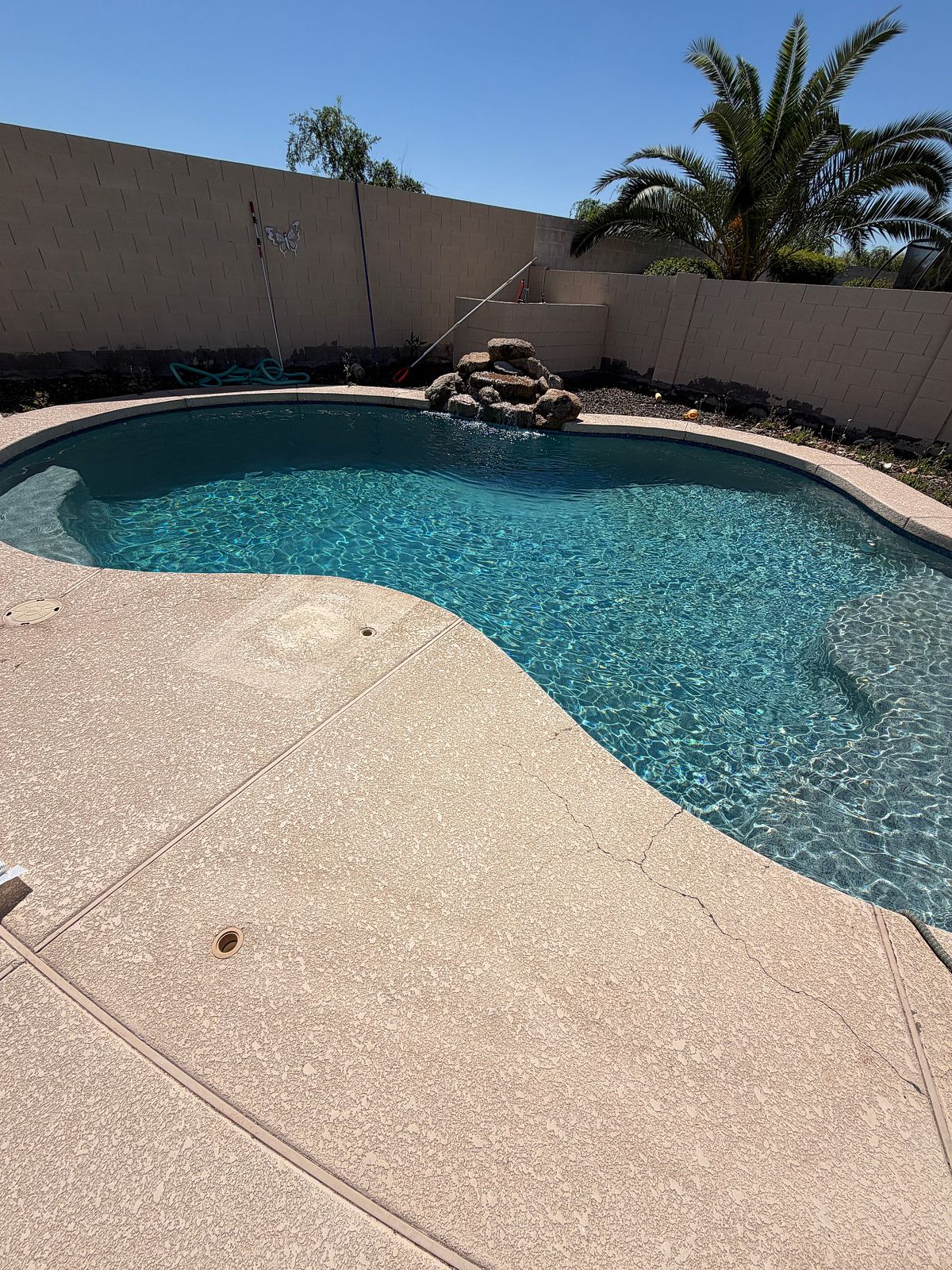 Clear blue pool after an acid wash