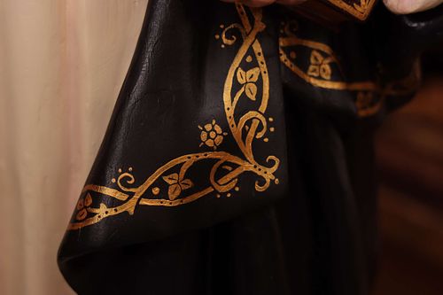 detail of the gold floral trim for the St Rose statue restoration