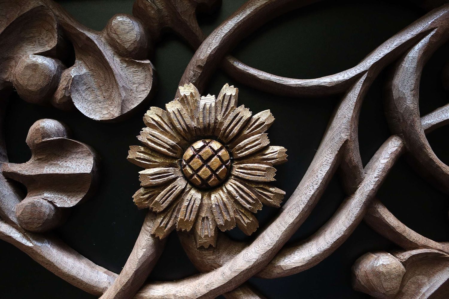 hand-carved and hand-painted goatsbeard flower by Wes and Kelly Baker for St. Joseph Shrine in St. Bernadette Catholic Church in Lancaster, Ohio