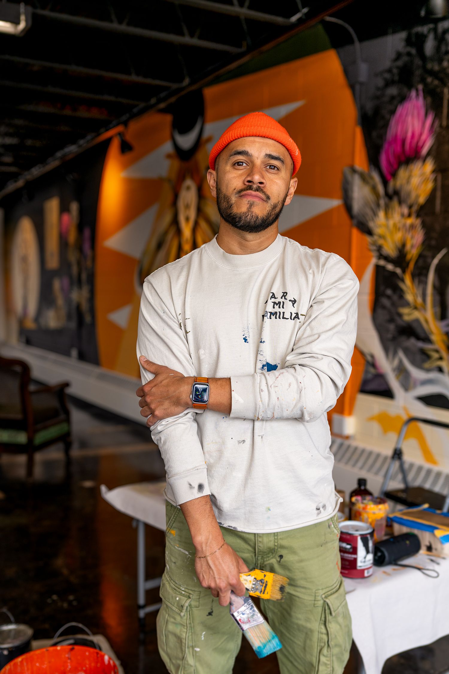 Portrait of Armando Silva, Editorial image in front of painting. editorial