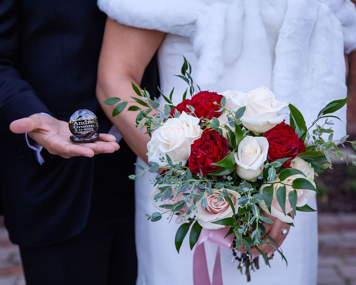 close-up photo of the brides flower's and the grooms gift at baywood