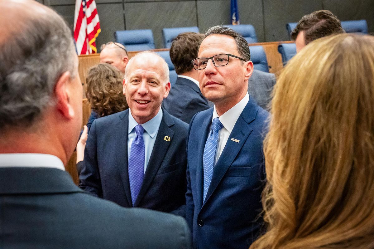Corporate event photography capturing Governor Josh Shapiro speaking with attendees after Judge Gail Weilheimer’s 2025 investiture in Philadelphia, highlighting leadership, authenticity, and connection.
