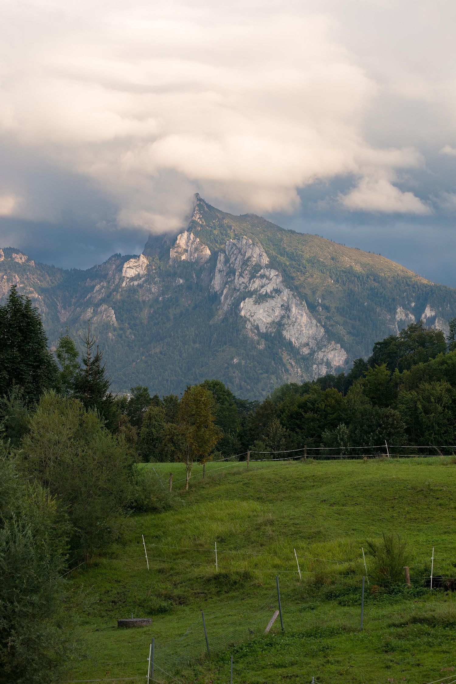 the peak the green and the clouds