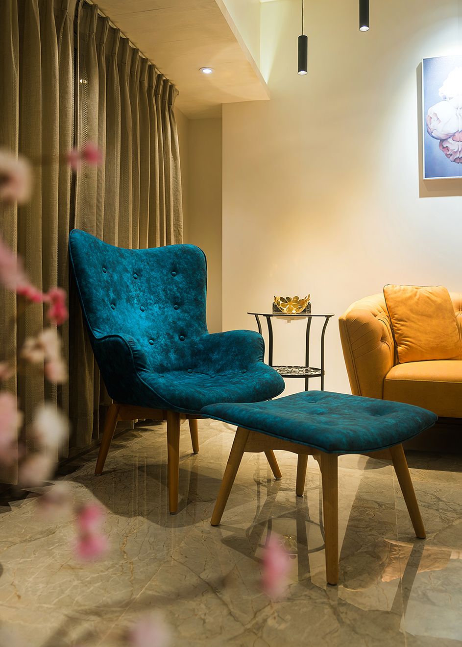 interior architecture photographer : Home Interior living room design with an stylish accent chair by Interior Photographer Akkil Suvarna