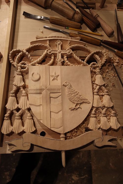 custom hand carved traditional coat of arms for Bishop Shawn McKnight