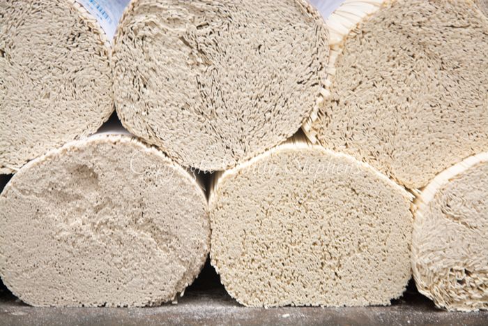 Stacks of drying rice noodles