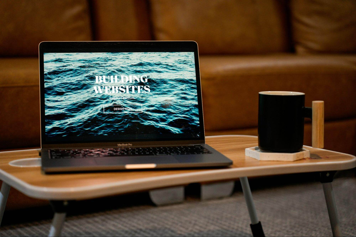Work from home setup with a laptop and a coffee mug