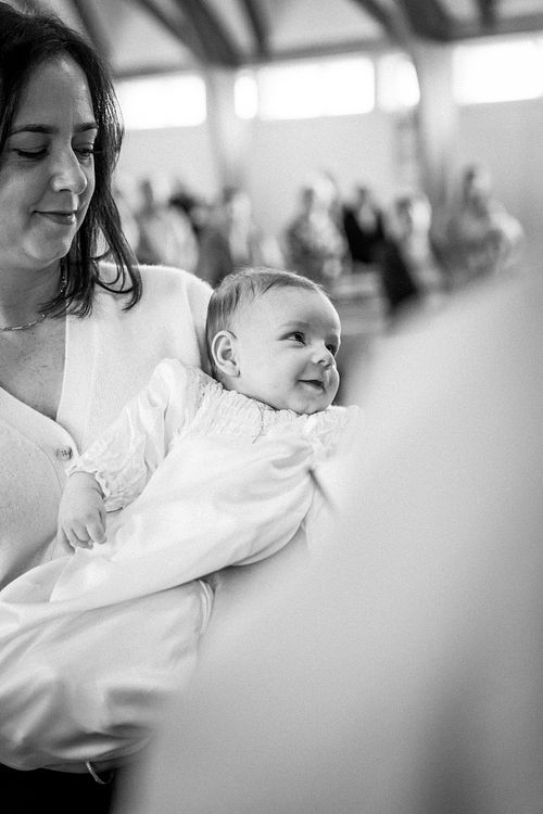 Ottawa Catholic baptism photographer capturing emotional moments