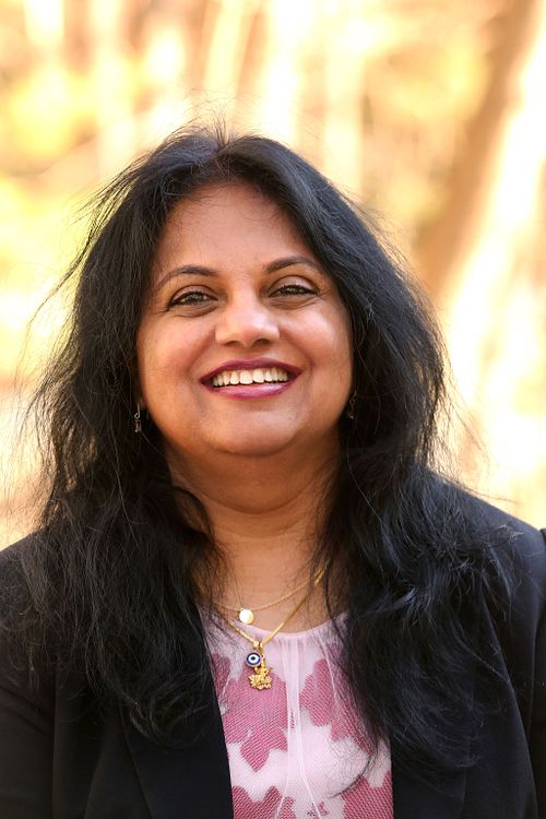 Aruna T.