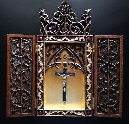 carved wood and gold leaf shrine for a crucifix full of relics for a Catholic home by Wes Baker