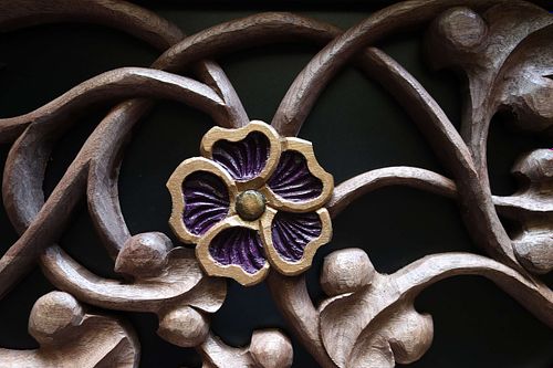 hand-carved and hand-painted hollyhock flower for shrine to St. Joseph by Wes and Kelly Baker
