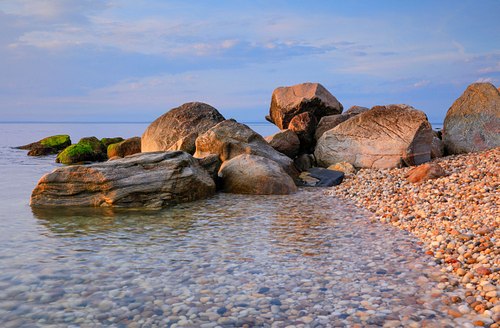_Glacial erratics between land and sea.