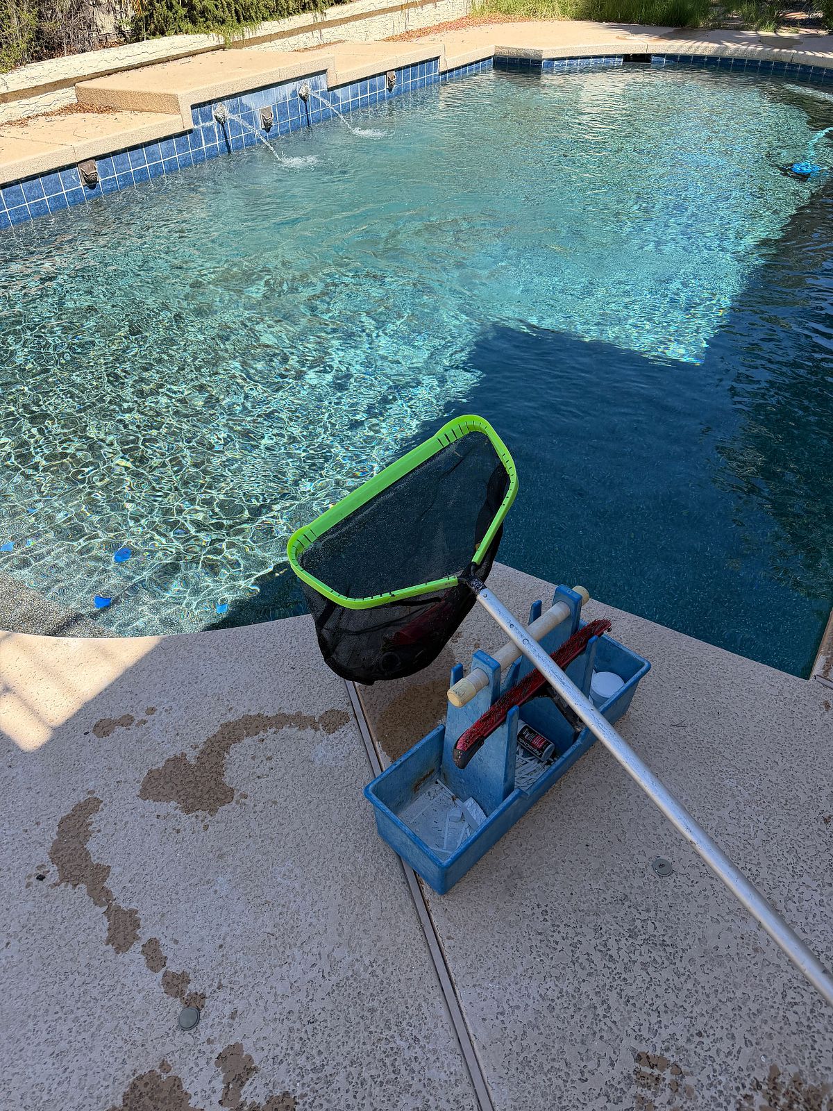 Clean blue pool after being serviced
