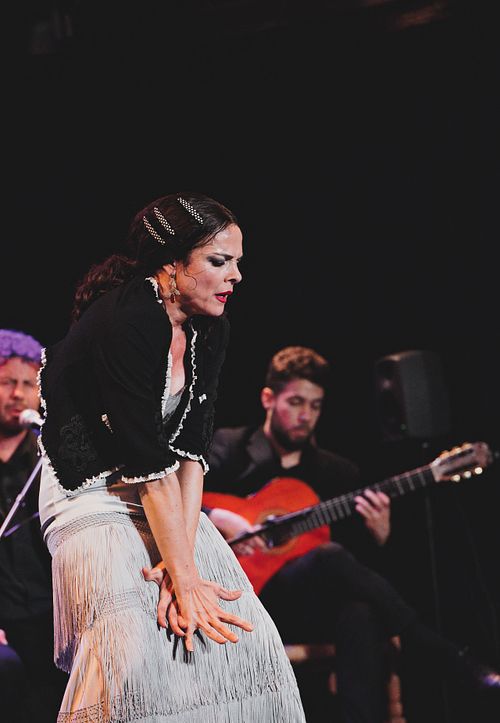 Anamarga dancing passionate flamenco in tablao in Jerez