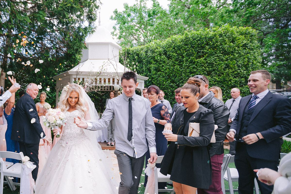 Flowers confetti after the ceremony at Enchanted Garden, Curzon Hall.